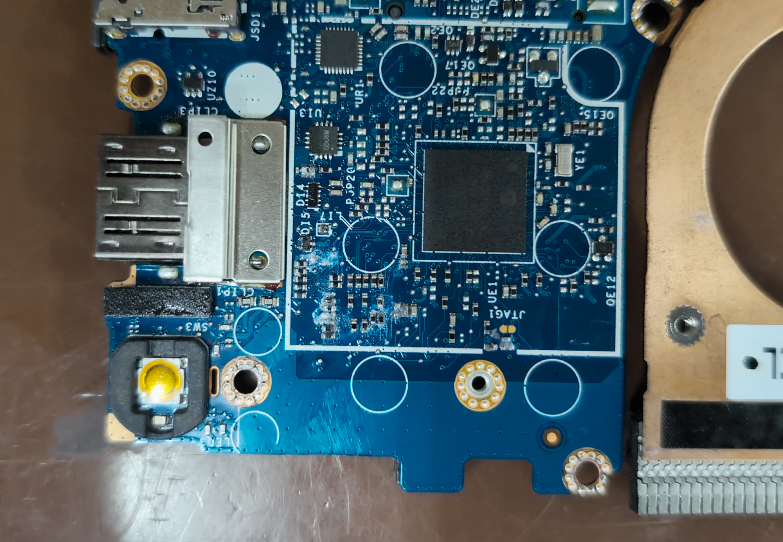 Board-level repair of shorted main power rail on Dell Latitude 7400 motherboard