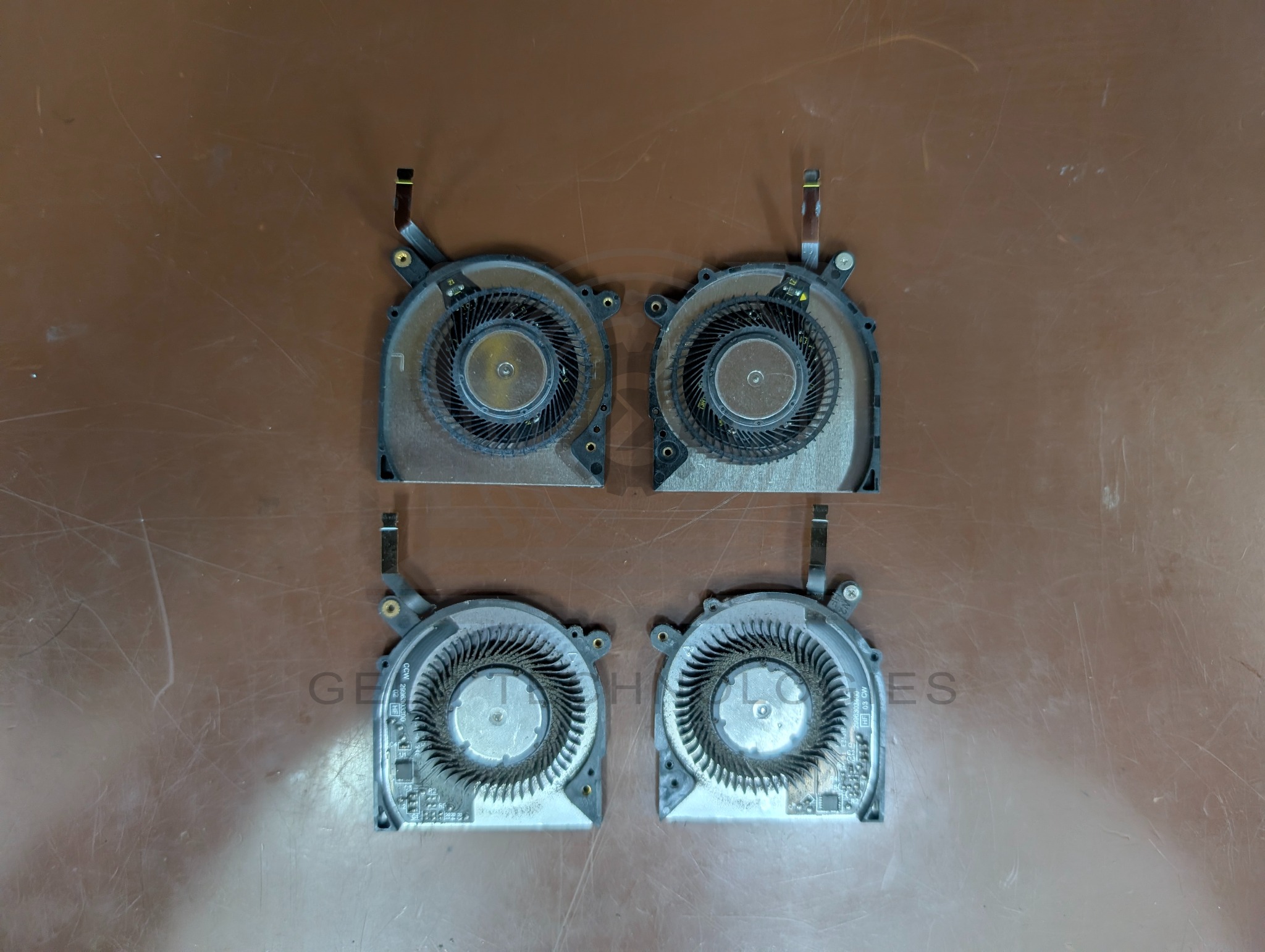 Removed and replacement cooling fans for Dell XPS 13 7390 2-in-1