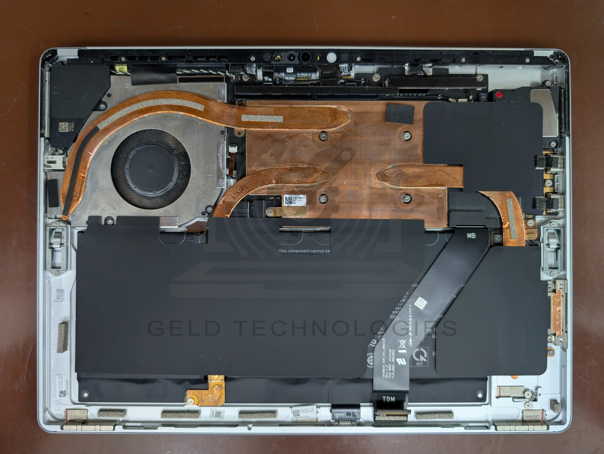 Surface Pro 8 Model 1982 internal battery and cooling assembly before battery replacement