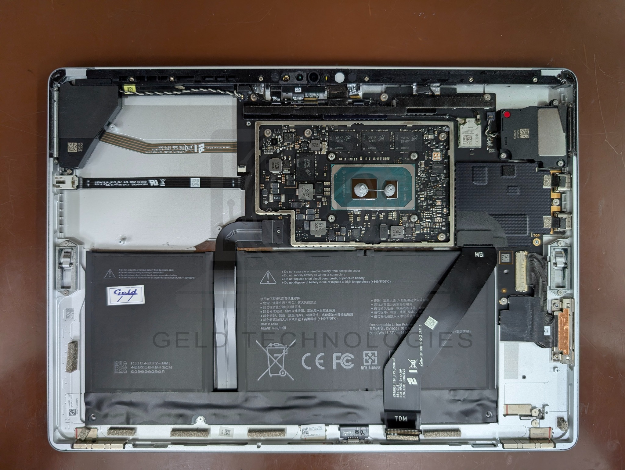 Surface Pro 8 with replacement battery installed and fresh thermal paste applied